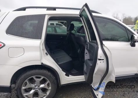 2018 Subaru Forester 2.5I Touring z USA, uszkodzony, nr VIN JF2SJAWC5JH613121